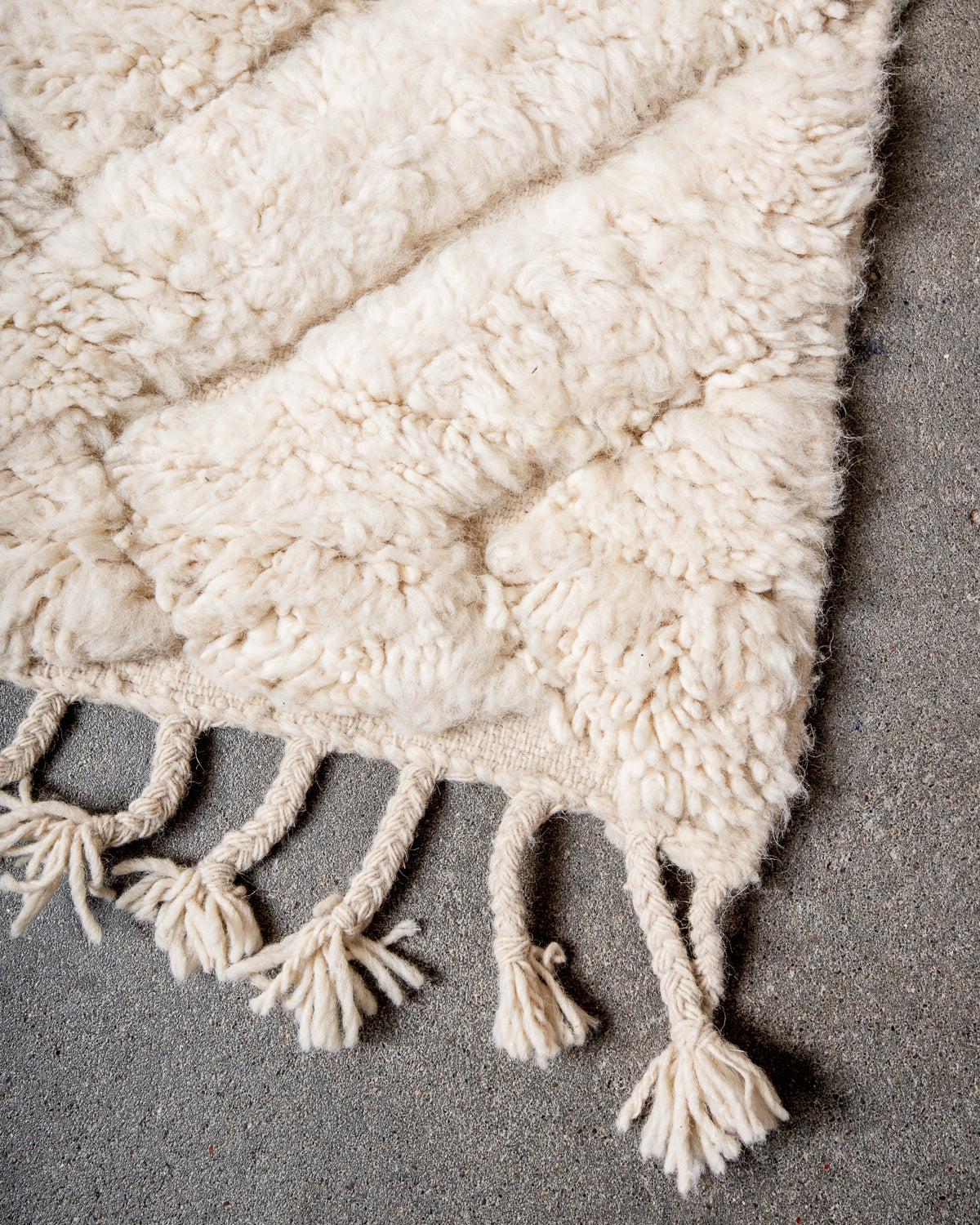 Modern, designer, handcrafted Berber rug from Morocco. Beniourain carpet with minimalist design, natural wool pile and a fluffy texture.